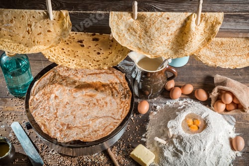 Preview: Rustic Display of Homemade Crepes with Ingredients
