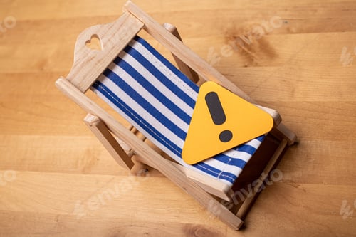 Preview: Closeup shot of a mini sun lounger with a mini sign