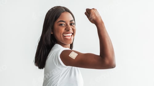 Preview: Black Vaccinated Female Showing Shoulder With Patch And Biceps