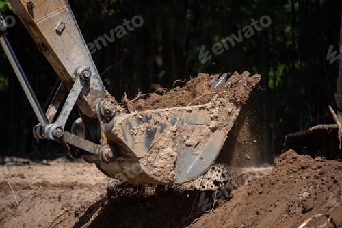 Preview: bulldozer machine digging the ground and removing sand for excavation purpose