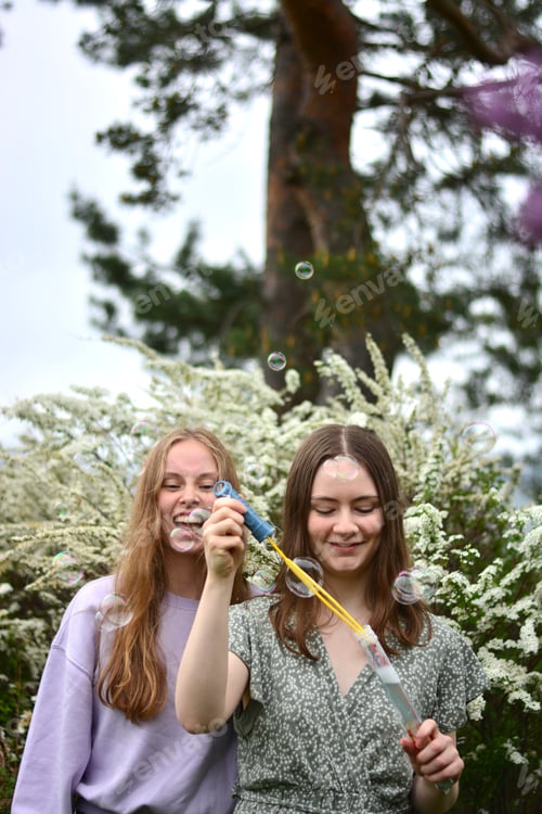 Preview: Girls blowing bubbles