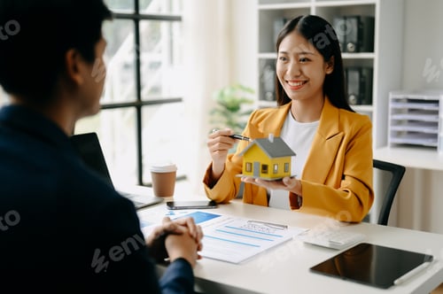 Preview: Asian Real estate broker agent presenting and consult to customer to decision making