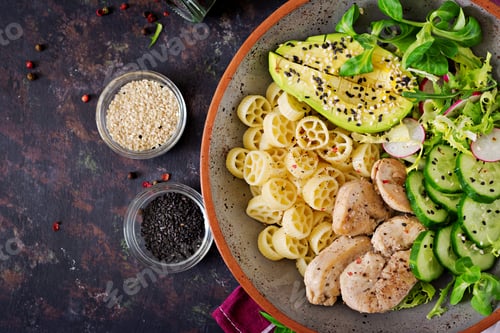 Preview: Healthy salad with chicken, avocado, cucumber, lettuce, radish and pasta