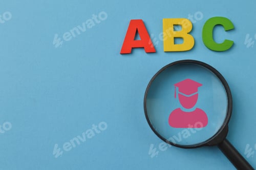 Preview: Wooden letters ABC and graduation symbol. Education concept.