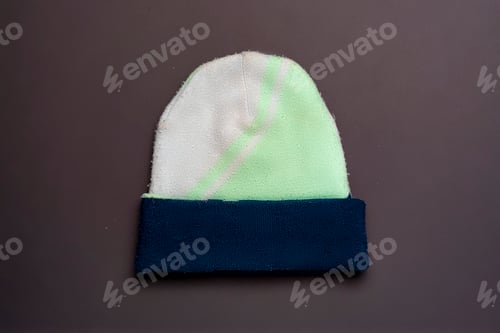 Preview: colorful woolen hat isolated on dark background b