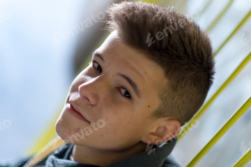 Preview: Portrait of Handsome teenage boy outdoors