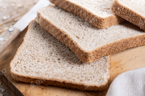 Preview: Healthy wholemeal bread slices on wooden table