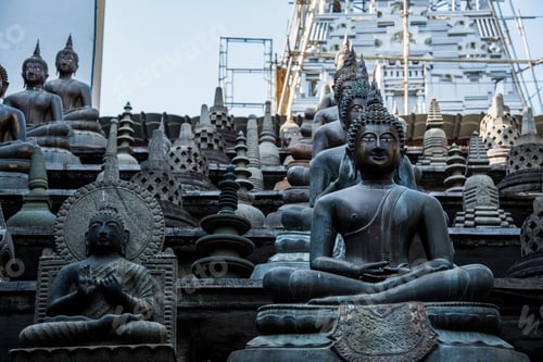 Preview: Buddha statues and small stupas in Gangaramaya temple, Colombo, Sri Lanka.