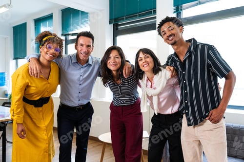 Preview: Startup business team embracing diversity and collaboration in modern office