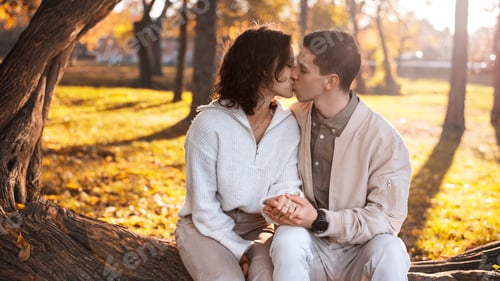 Preview: A romantic couple outdoors near a cafe