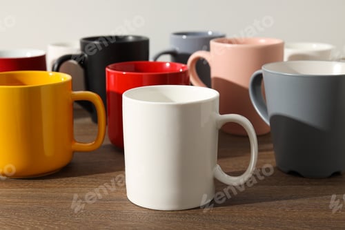 Preview: Multicolored beautiful cups on a light background