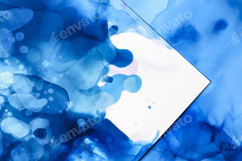 Preview: blue splashes of alcohol ink on white as abstract background