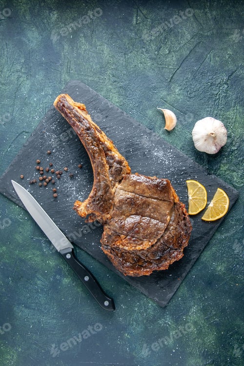 Preview: top view fried meat slice with lemon slices on dark background meat dinner food dish fry color