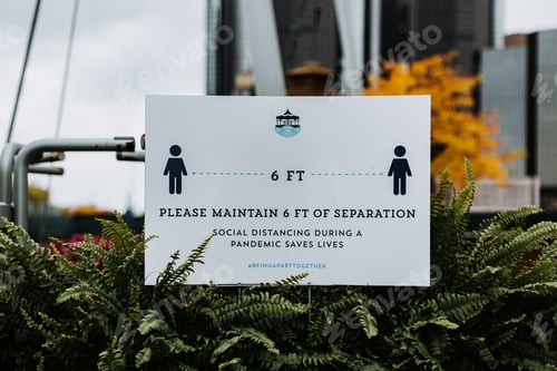 Preview: Six feet apart of separation, social distancing sign during a pandemic saves lives