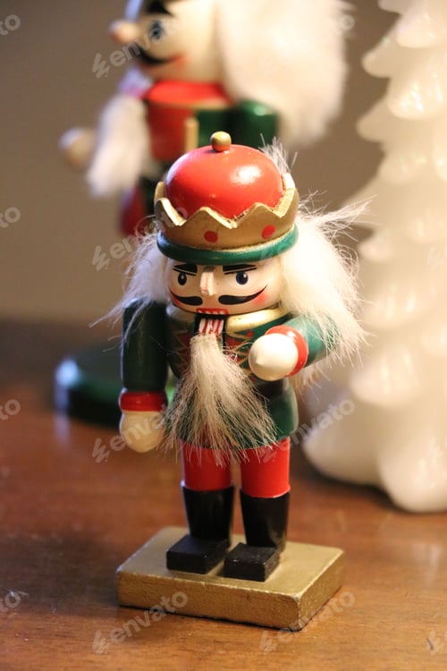 Preview: Close-up of a cute wooden toy soldier with a red hat