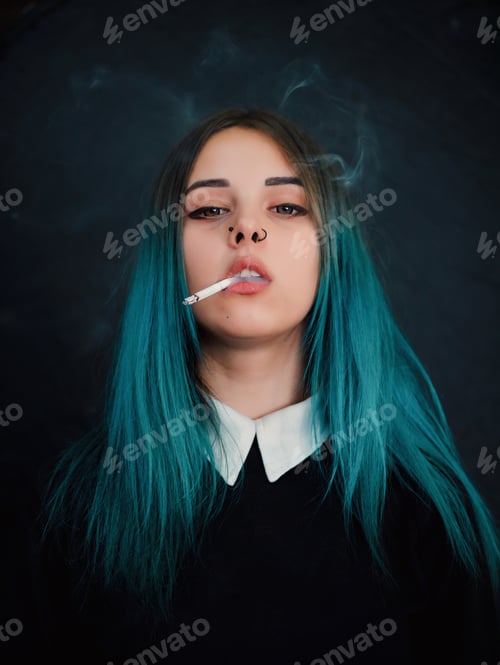 Preview: Portrait of Young girl with blue hair smoking cigarette. Woman, smoke, gen z