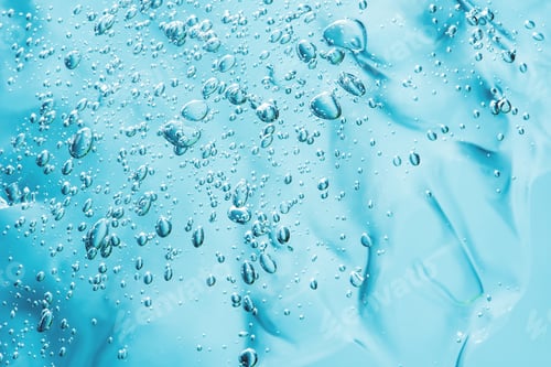 Preview: Close up macro Aloe vera gel cosmetic texture blue background with bubbles