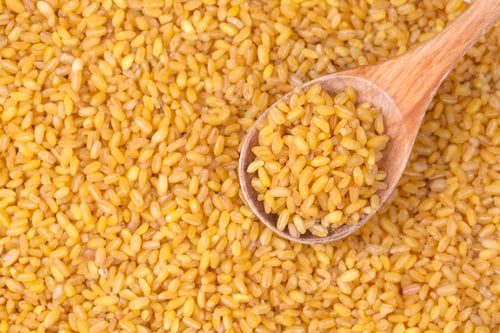 Preview: Dry raw bulgur in a glass bowl