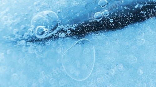 Preview: Ice with frozen air bubbles, close-up natural texture