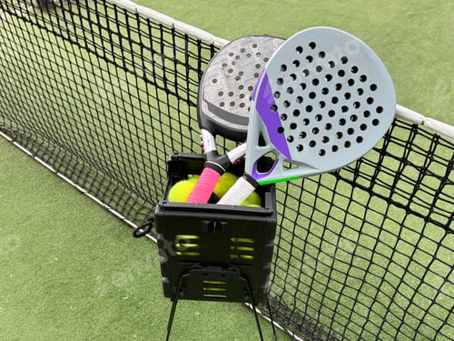 Preview: padel tennis racket sport court and balls.