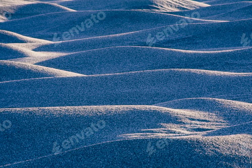 Preview: Ripples and patterns of sand dune at dawn.