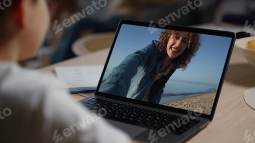 Preview: Happy sister videocalling child on travel vacation closeup. Joyful family talk