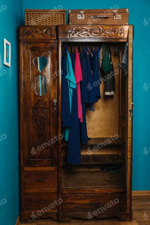 Preview: Vintage wooden wardrobe with clothes and suitcase