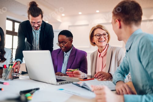 Preview: Multiracial business group of people having a meeting in an office