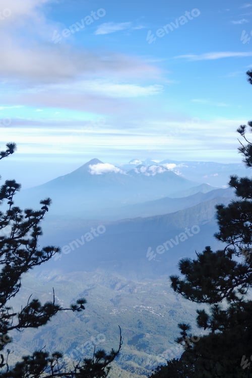 Preview: Mountain landscape with a blue sky clouds