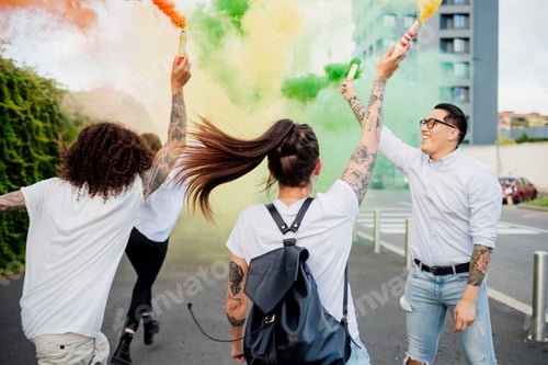 Preview: Friends celebrating with colorful smoke flares in the city
