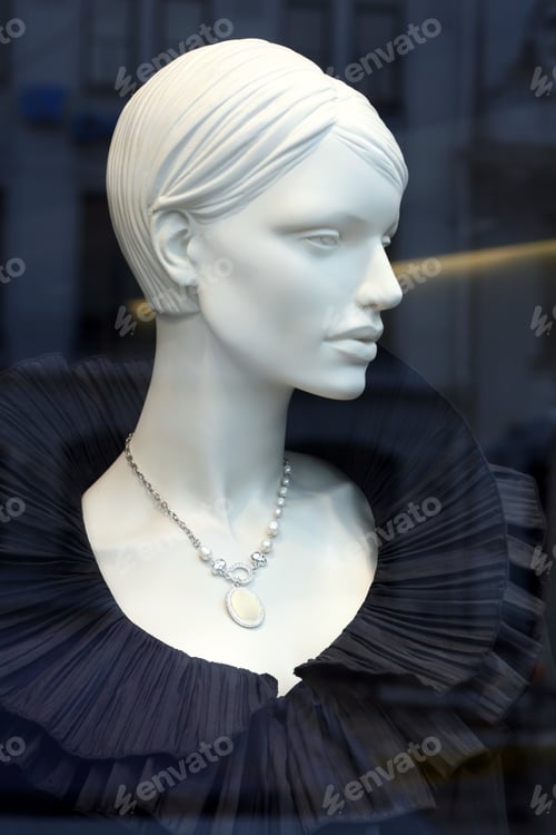 Preview: Luxury mannequin dreesed in elegant black evening dress on display