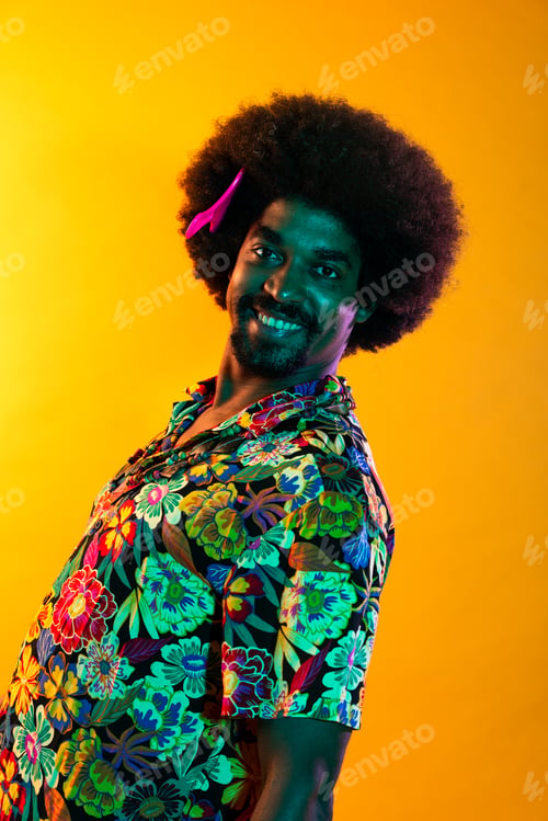 Preview: African man portrait in studio on colorful background
