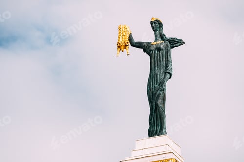 Preview: Batumi, Adjara, Georgia. Statue Of Medea On Sky Background In Europe Square. Woman Holding Golden