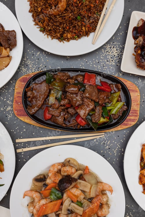Preview: Assorted Chinese food. fried rice, dumplings, beef with oyster sauce, chopsuey.