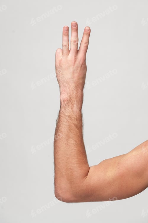 Preview: Mans Hand Showing Sign against gray background