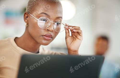 Preview: Office, computer and black woman with glasses, thinking or reading email, online research or report