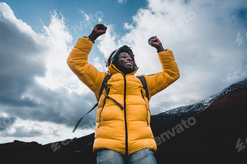 Preview: Hiker man with arms raised