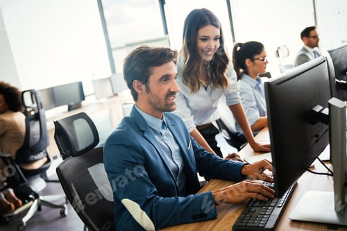 Preview: Portrait of successful business team working in office