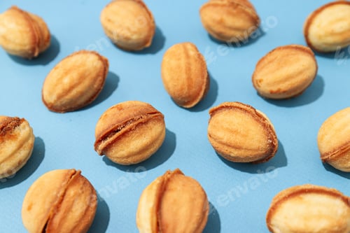 Preview: Cookies in the form of nuts on a blue background