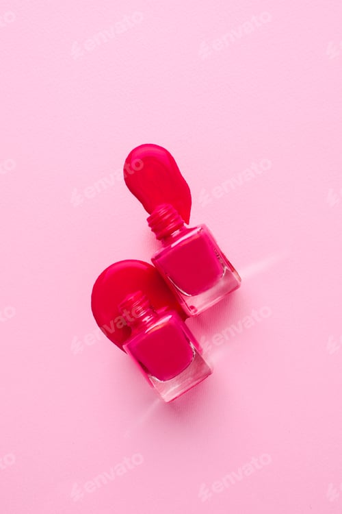 Preview: Two Bottles of Pink Nail Polish on Pink