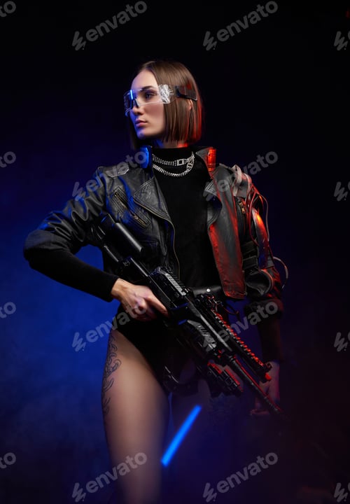 Preview: Military woman with eyewear and rifle posing in dark background