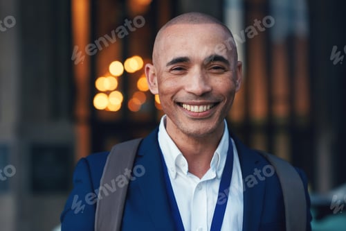 Preview: Portrait mixed race businessman smiling in city