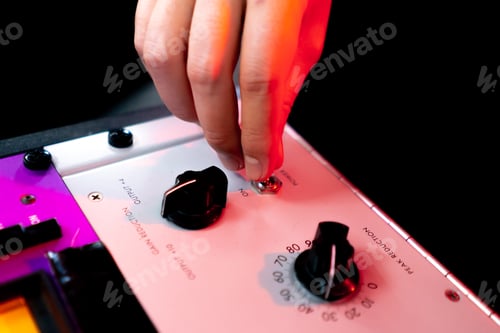 Preview: in the recording room under neon lighting professional remote control for adjusting the sound the