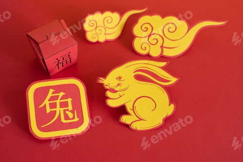 Preview: Decorations and symbols of the Chinese New Year isolated on empty red background