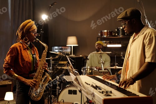 Preview: Musicians Rehearsing in Cozy Studio Environment