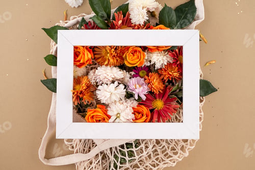 Preview: Orange and red garden flowers in the mesh bag Mockup white tags with space for text Background