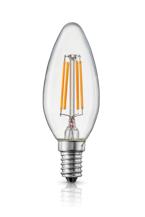 Preview: LED candle filament light bulb with e14 base isolated on white.
