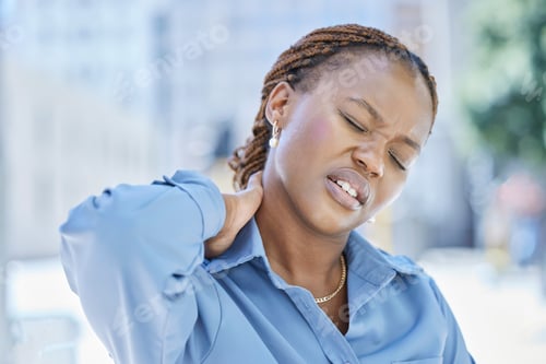 Preview: Woman manager with stress and pain in her neck while standing outside the office building. Female b