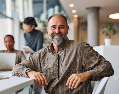 Preview: Young business people working in the office