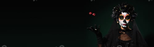 Preview: Woman in mexican day of dead costume and makeup throwing dice on dark green background, banner